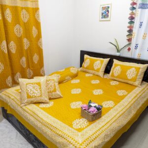 vibrant orange-colored 100% Twill Cotton Hand Block king size bedsheet, meticulously hand-blocked with intricate patterns, adding a pop of color and artisanal flair to your bedroom decor