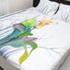 Artfully hand-painted blossom designs adorn a luxurious twill cotton bedsheet, adding elegance and charm to any bedroom decor