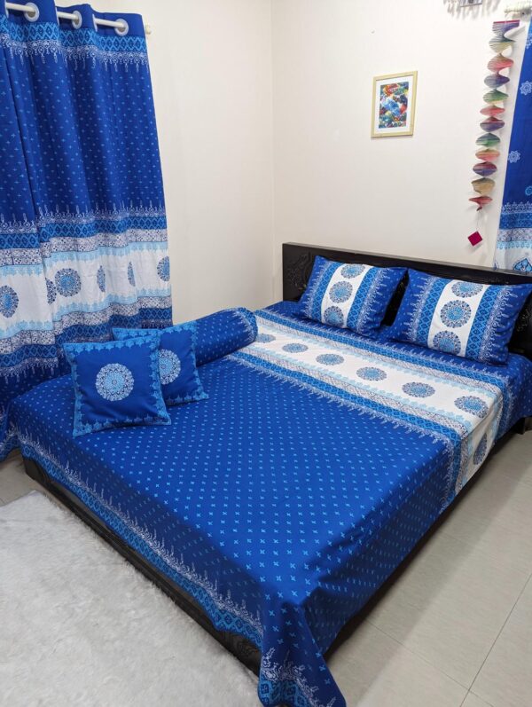 Indulge in luxury with handcrafted Soft Twill Cotton king-size bedsheet, meticulously block-printed on 100% pure cotton reminiscent of tranquil ocean blues, enhancing room's ambiance with elegance and style."