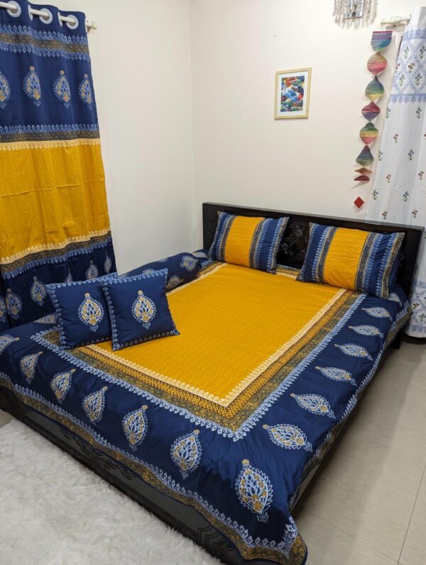 Behold exquisite Yellow and Navy Blue color combination Twill Cotton Luxury Hand Block King Size Bedsheet, meticulously crafted from pure cotton. Each intricate detail is delicately handcrafted, promising both elegance and comfort for your bedroom sanctuary